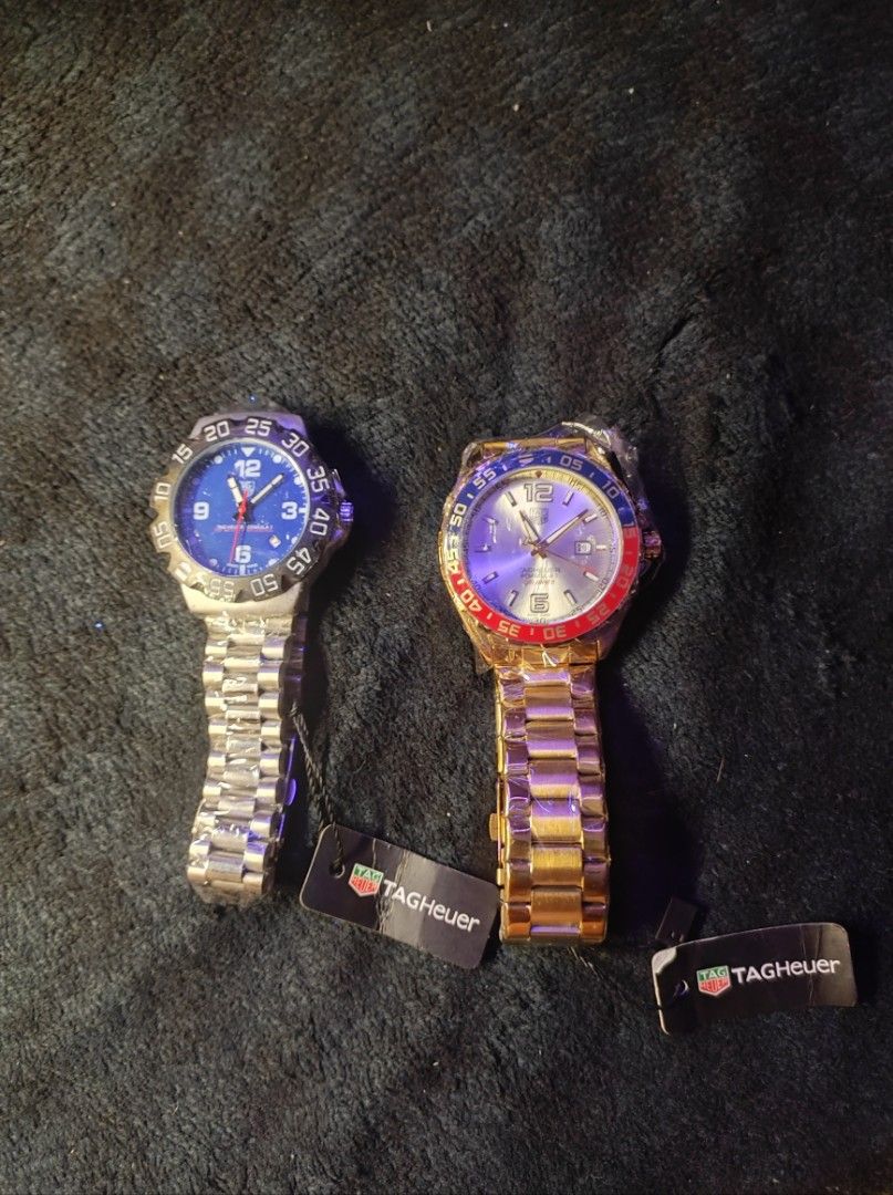 Tag Heuer Formula 1 Watches (2 pcs) (Category: Men's Watches) located in Pasay City. Submitted by mshadesofthrift. (Listing ID 1460690248, Image 1). Description: - Two Tag Heuer Formula 1 watches for sale. - Option 1: Silver watch with a blue dial. - Option 2: Gold watch with a silver dial and a red/blue bezel. - Ideal for watch collectors or for everyday wear. 1200 EACH 2200 ALL.