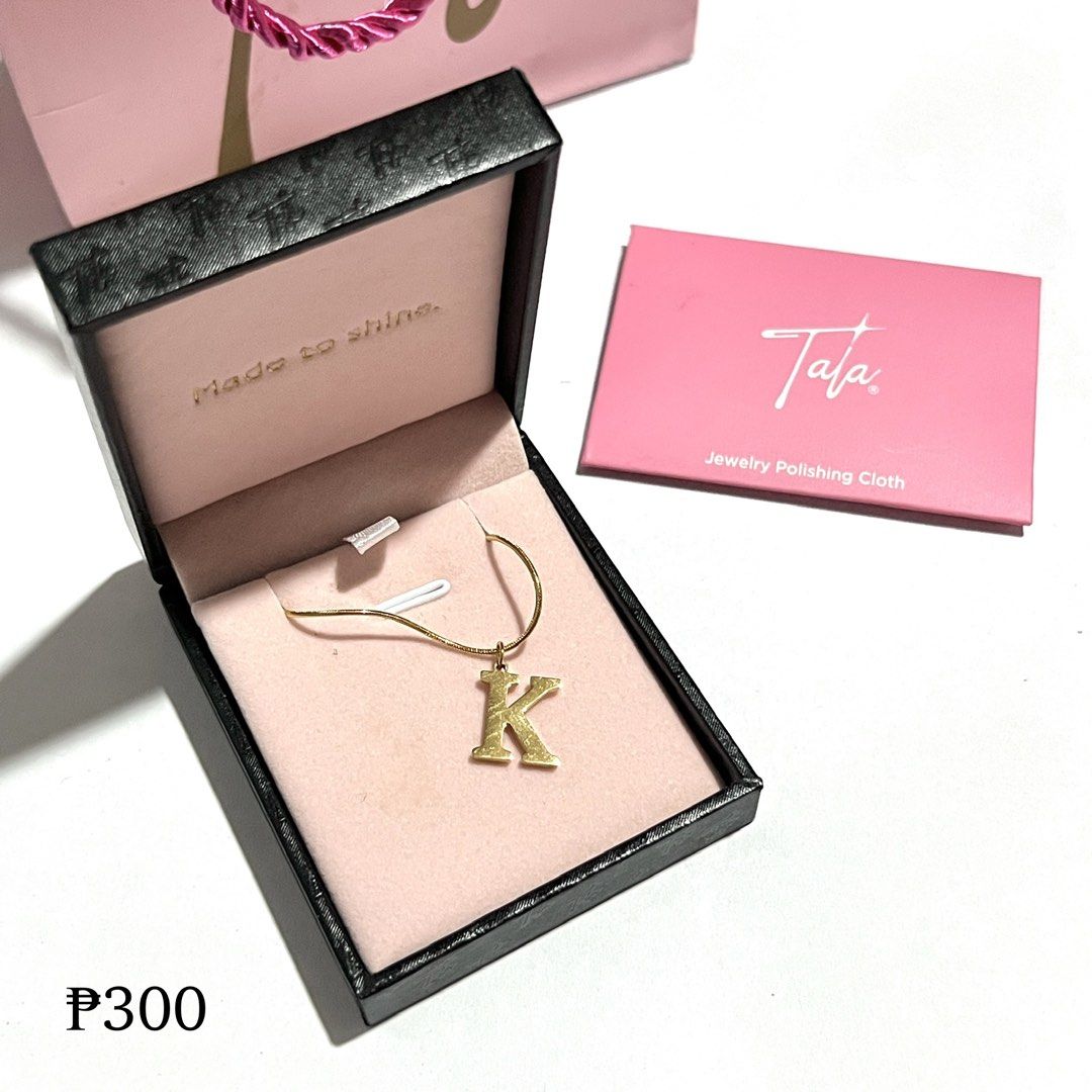 Tala by Kyla "K" Initial Necklace Gold (Category: Necklaces) located in Valenzuela. Submitted by luise_ (Listing ID 1460706051, Image 2). Description: - Gold necklace with a 'K' initial pendant. - Comes with its original Tala box and jewelry polishing cloth. - Features a delicate, snake-like chain. - The pendant is a bold, block letter 'K'. - Ideal for gifting or personal wear..