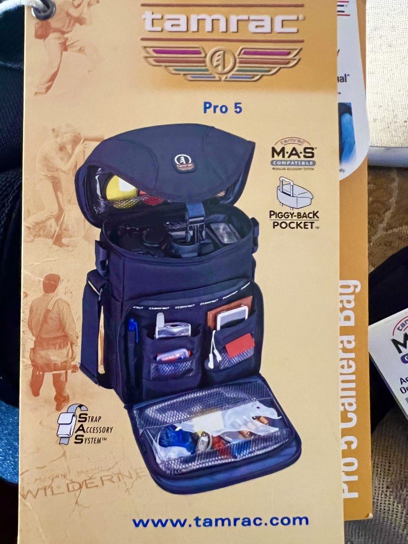 Authentic Tamrac Pro 5 Professional Camera Bag (Category: Camera Bags & Carriers) located in Muntinlupa City. Submitted by arisofcalico (Listing ID 1460522932, Image 2). Description: Authentic Tamrac Pro 5 Large Profesdional Camera Bag World renowned Tamrac brand of photo equipment accesories New, never been used. Bought from the Dubai International Airport store More than enough space you eill need for your equipment Heavy padded shoulder strap 