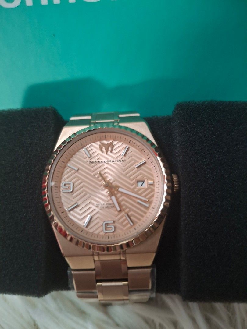 TechnoMarine Rose Gold Watch (Category: Women's Watches) located in Quezon City. Submitted by maxxxsky (Listing ID 1460644660, Image 2). Description: - Rose gold TechnoMarine watch - Features a patterned dial - Stylish metal bracelet - Water resistant up to 100 meters - Comes with original box and tag - Versatile for everyday or special occasions.