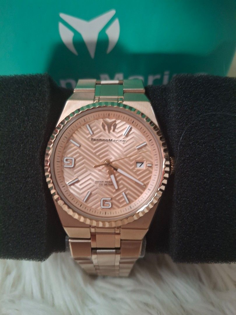 TechnoMarine Rose Gold Watch (Category: Women's Watches) located in Quezon City. Submitted by maxxxsky (Listing ID 1460644660, Image 3). Description: - Rose gold TechnoMarine watch - Features a patterned dial - Stylish metal bracelet - Water resistant up to 100 meters - Comes with original box and tag - Versatile for everyday or special occasions.