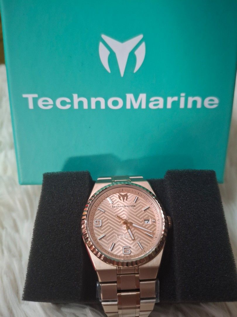 TechnoMarine Rose Gold Watch (Category: Women's Watches) located in Quezon City. Submitted by maxxxsky (Listing ID 1460644660, Image 1). Description: - Rose gold TechnoMarine watch - Features a patterned dial - Stylish metal bracelet - Water resistant up to 100 meters - Comes with original box and tag - Versatile for everyday or special occasions.