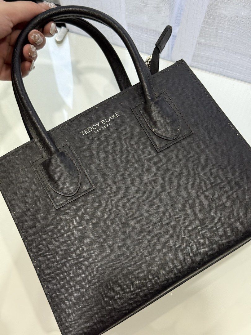 Teddy Blake Black Bag (Category: Luxury Bags & Wallets) located in General Trias. Submitted by fellasunshine (Listing ID 1460642441, Image 1). Description: - from america - original from teddy blake - super nice pa di ko lang nagagamit - lalamove or pickup.
