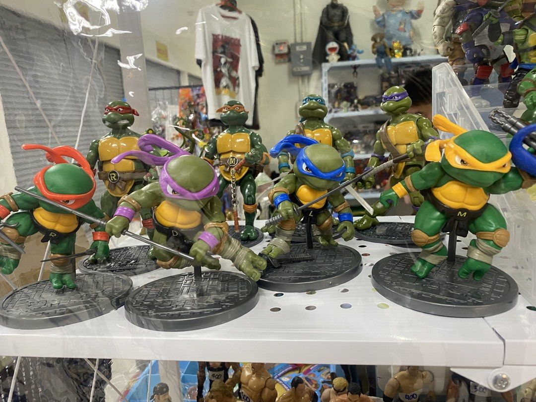 Teenage Mutant Ninja Turtles Action Figures Set (Category: Figurines & Statues) located in Manila. Submitted by curlcyspreloved (Listing ID 1460636610, Image 1). Description: - Set of 4 Teenage Mutant Ninja Turtles mini action figures - set of 4 Teenage Mutant Nunja Turtles - Includes Leonardo, Donatello, Michelangelo, and Raphael - Comes with their signature weapons - Includes display bases for each figure - Ideal for collectors and fans of the 