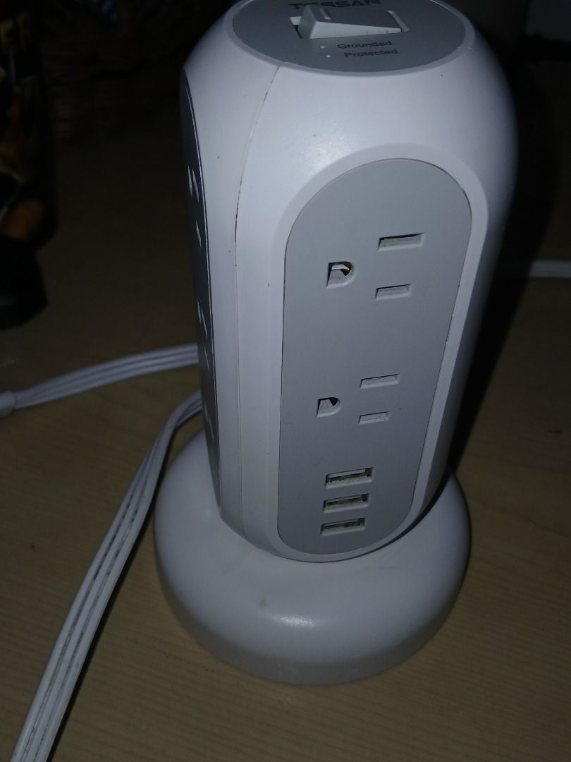 TESSAN Tower Power Strip with USB Ports (Category: Office & Business Technology) located in Manila. Submitted by cosmicturtle.d1b615 (Listing ID 1460651272, Image 2). Description: - TESSAN Tower Power Strip - Multiple AC outlets and USB ports - Space-saving vertical design for desks/tables - Charge multiple devices simultaneously - Good cord length - Reliable performance.