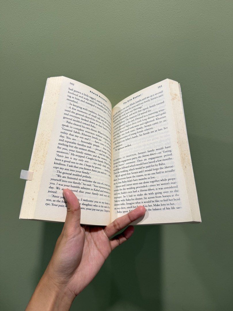 The Kite Runner by Khaled Hosseini Novel (Category: Storybooks) located in Manila. Submitted by yonderingheights (Listing ID 1460705943, Image 3). Description: - The Kite Runner by Khaled Hosseini - #1 New York Times Bestseller - "Powerful. Haunting." - The New York Times Book Review - Pages are clean with some yellowing on the edges - Cover shows some wear.