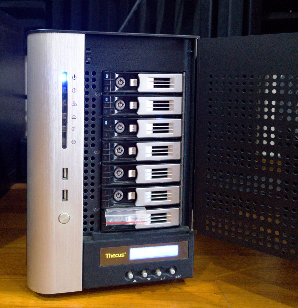 Thecus N7700 7 Bays NAS Enclosure Server with free 3x 2TB HDD (Category: Networking) located in Singapore. Submitted by tkm00 (Listing ID 1460577095, Image 2). Description: Thecus N7700 NAS Enclosure - 7 Drive Bays - Front USB Ports - Front LCD Display, in good working condition. - Rear LAN Port - Rear WAN Port - Rear USB Ports - Rear eSATA Port - Perfect for Network Attached Storage - With lock key and all the screws for the HDD Upgraded memory 