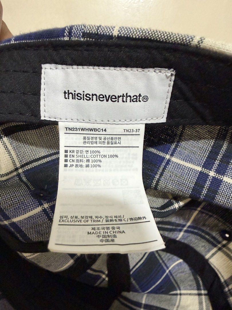 Thisisneverthat Plaid Cap TN231WHWBC14 (Category: Caps & Hats) located in Quezon City. Submitted by vincentstaana06 (Listing ID 1460714515, Image 3). Description: - Authentic Thisisneverthat plaid cap - Embroidered brand name on front - Made from 100% cotton - Includes DPRO International sticker - Ideal for everyday wear.