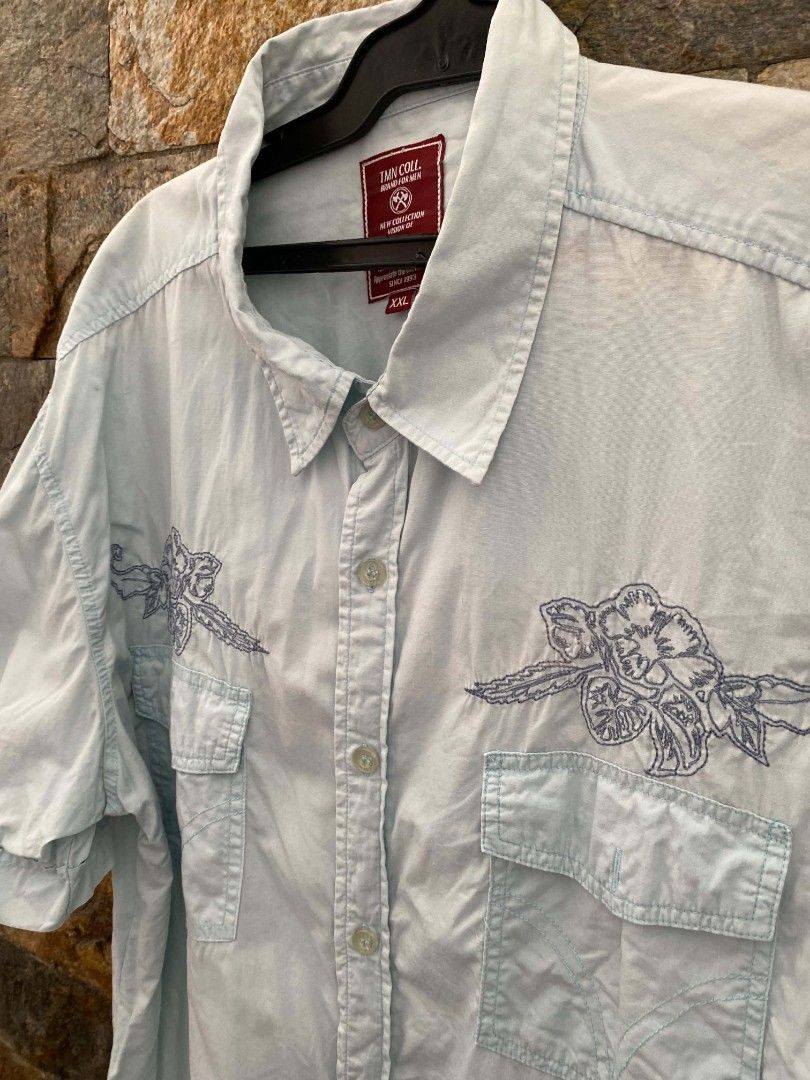 TMN coll.short Sleeve Polo (Category: Activewear) located in Manila. Submitted by asiongmx (Listing ID 1460643222, Image 3). Description: TMN Coll. Short Sleeve Polo Size M but xxl on tag Made in China Embroided design on front Quezon City area Decluttering.
