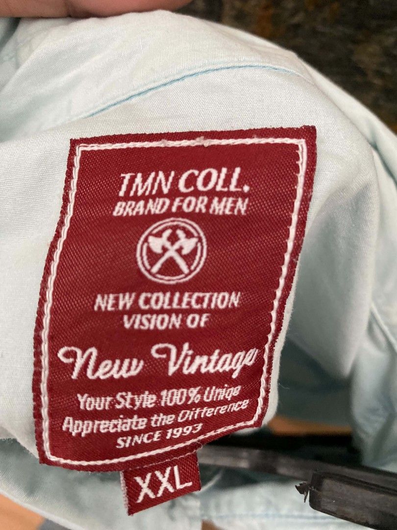 TMN coll.short Sleeve Polo (Category: Activewear) located in Manila. Submitted by asiongmx (Listing ID 1460643222, Image 2). Description: TMN Coll. Short Sleeve Polo Size M but xxl on tag Made in China Embroided design on front Quezon City area Decluttering.