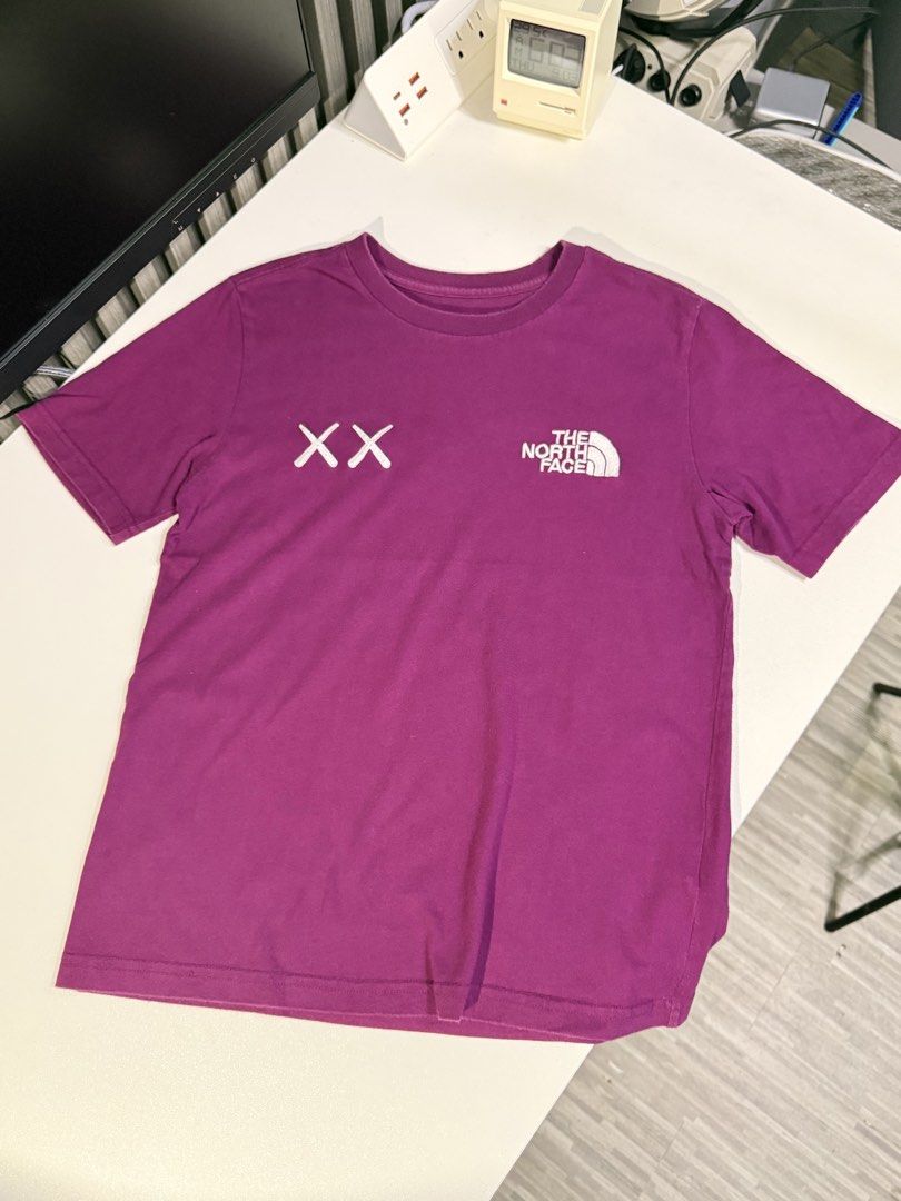 TNF X Kaws (Category: Activewear) located in Bulacan. Submitted by jomar_0705 (Listing ID 1460513281, Image 2). Description: TNF X Kaws Medium on tag W17 L23 Excellent No issue.