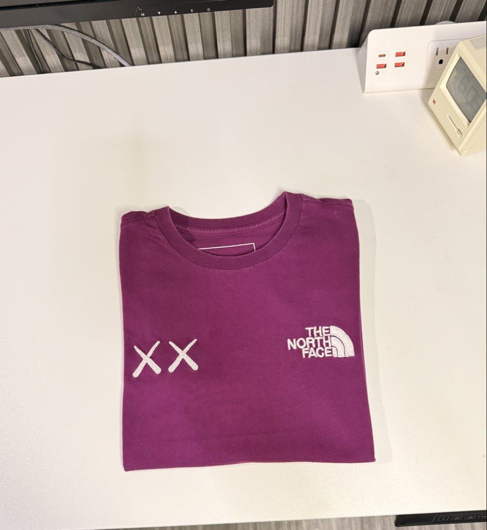 TNF X Kaws (Category: Activewear) located in Bulacan. Submitted by jomar_0705 (Listing ID 1460513281, Image 1). Description: TNF X Kaws Medium on tag W17 L23 Excellent No issue.