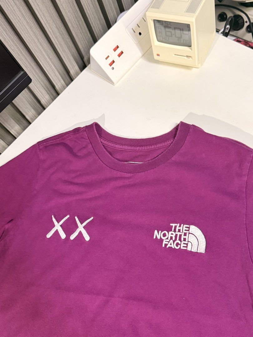 TNF X Kaws (Category: Activewear) located in Bulacan. Submitted by jomar_0705 (Listing ID 1460513281, Image 3). Description: TNF X Kaws Medium on tag W17 L23 Excellent No issue.