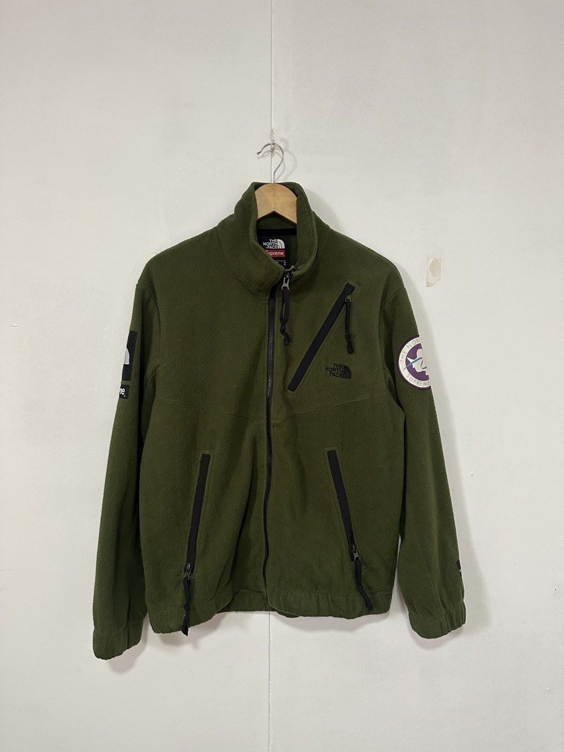 TNF x Supreme Jacket (Category: Coats, Jackets and Outerwear) located in Las Pinas. Submitted by archimedes.joaquin (Listing ID 1460537925, Image 1). Description: good as new condition - 9.7/10 color rate - ykk zippers - Small on tag us size 22 width 27 length ( best fit large ) - No issue Complete with code.