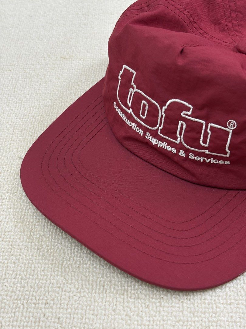 Tofu Construction Supplies & Services Cap Burgundy (Category: Caps & Hats) located in Manila. Submitted by porma.market (Listing ID 1460518936, Image 1). Description: - Burgundy classic baseball cap style - Embroidered 'Tofu Construction Supplies & Services' logo on front - Standard adult size - Minimal signs of wear - Ideal for casual wear or streetwear.