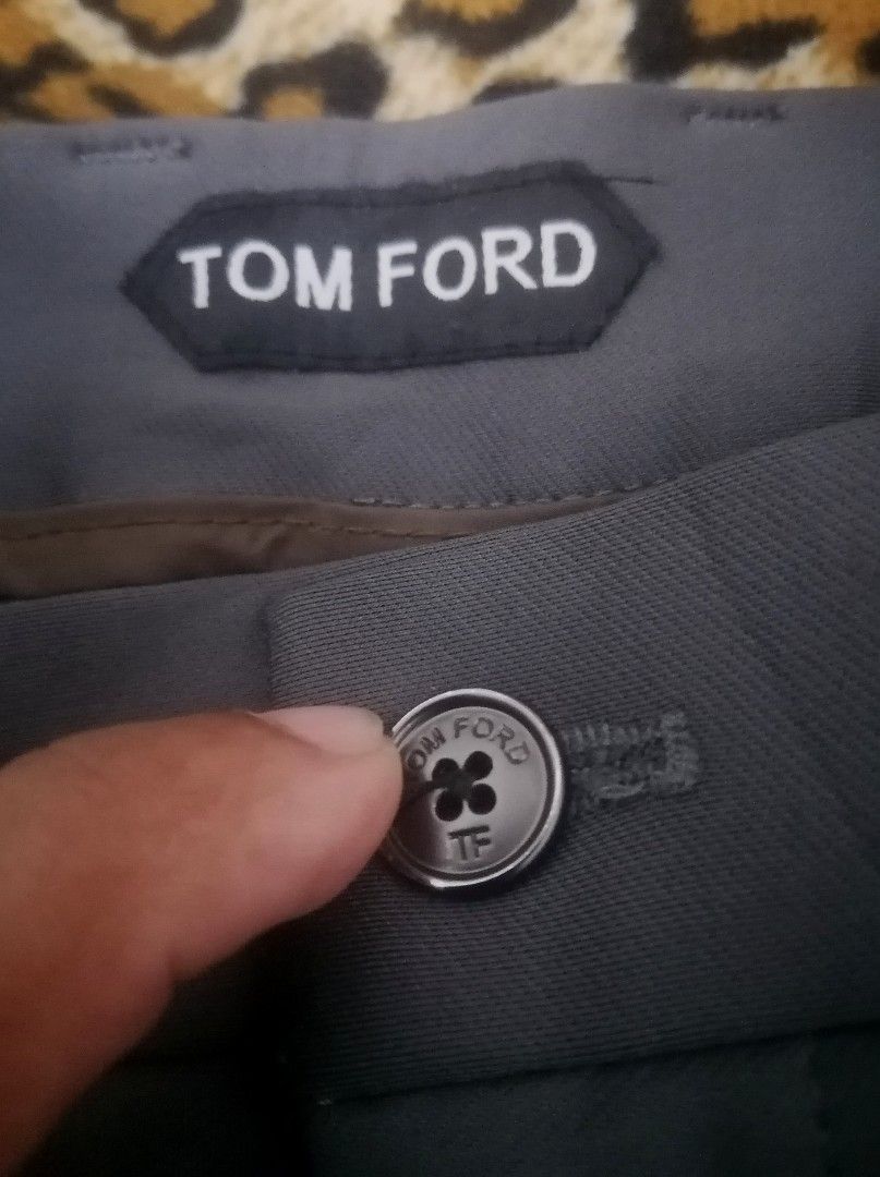 Tom Ford Grey Tailored Trousers Size 34 (Category: Trousers) located in Cebu City. Submitted by roadthrift (Listing ID 1460583530, Image 3). Description: - Brand: Tom Ford - Color: Grey - Size: 34 - Fit: Classic - Style: Smart casual to formal - Closure: Button with zip fly - Pockets: Two side, two back - Material: Comfortable stretch fabric - Care: Machine wash cold inside out.