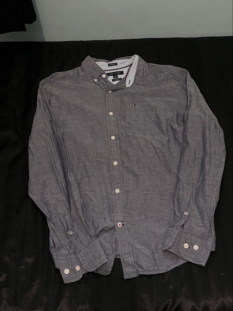 Tommy hilfiger button down (Category: Formal Shirts) located in Caloocan City. Submitted by jeremih_ (Listing ID 1460606075, Image 1). Description: Size M on tag color rate: 9/10 complete buttons no issue Dm for more details .