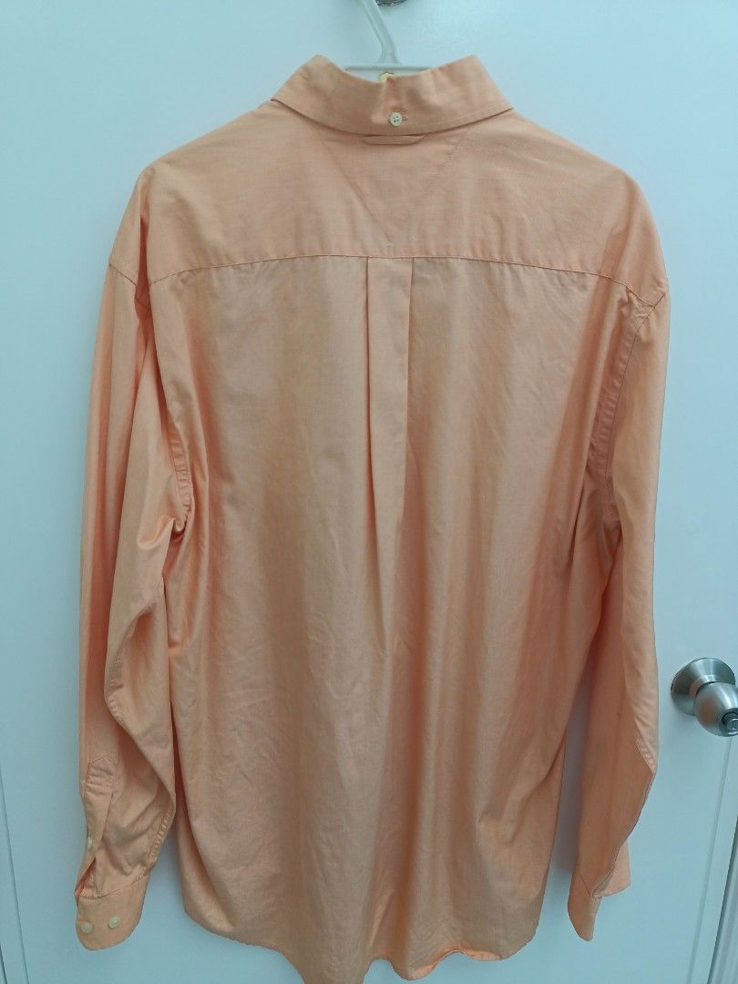 Tommy Hilfiger Long Sleeve Button Down Shirt Size M (Category: Tshirts & Polo Shirts ) located in Pasig City. Submitted by leaves21 (Listing ID 1460667374, Image 3). Description: - Tommy Hilfiger long sleeve shirt - Classic button-down style - Left chest pocket - Made of 100% cotton - Versatile for casual and smart casual outfits - Pre-owned, in good condition.