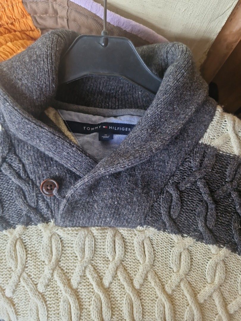 Tommy Hilfiger Men's Cable Knit sweater (Category: Coats, Jackets and Outerwear) located in Manila. Submitted by musthave1984 (Listing ID 1460551181, Image 1). Description: - Brand: Tommy Hilfiger - Color: Grey and Cream - Style: Cable Knit Cardigan - Features: Button closure, Shawl collar - Perfect for: Staying warm and layering outfits.
