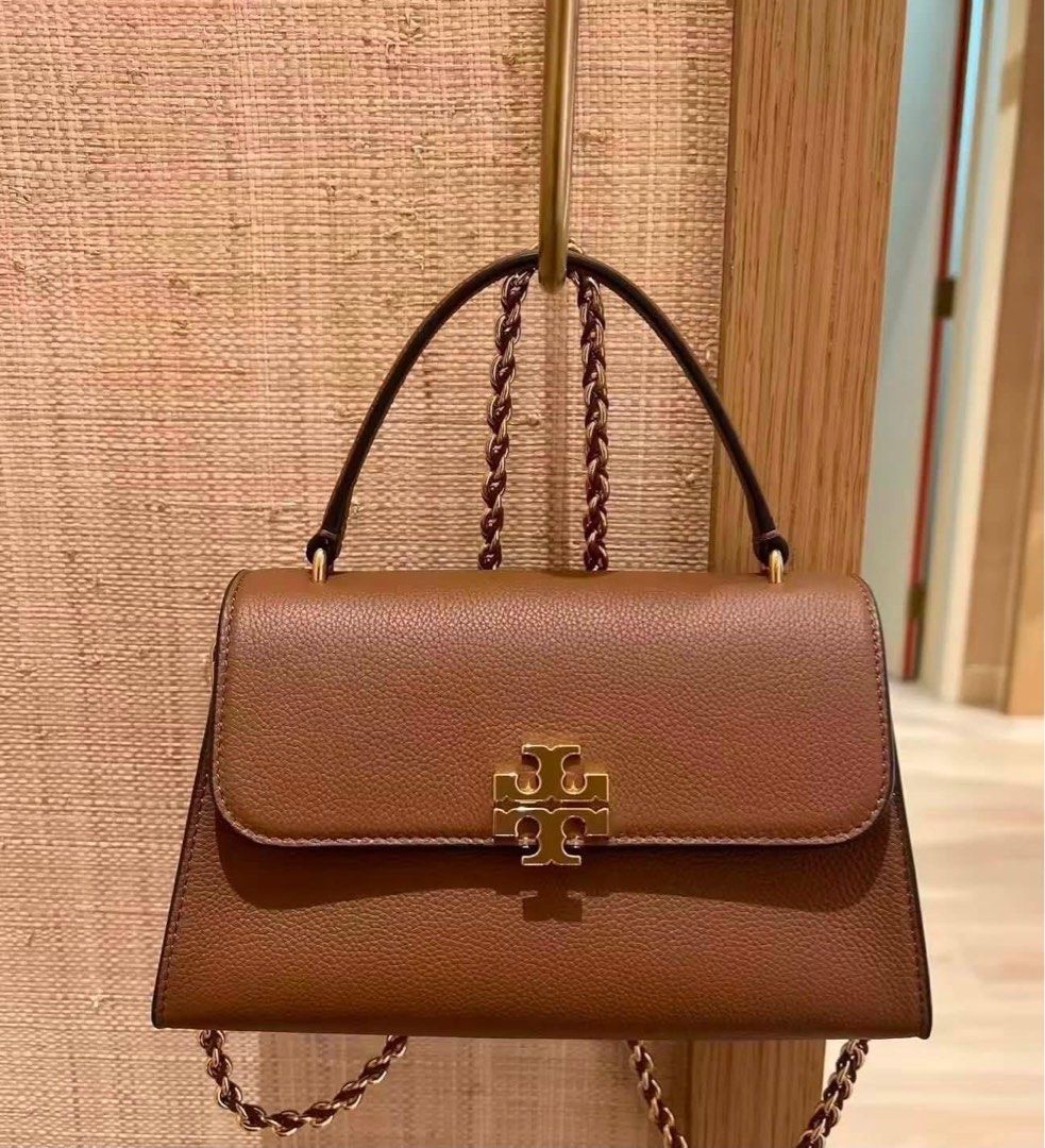 Tory Burch Britten Top Handle Bag (Category: Cross-body Bags) located in Manila. Submitted by btdcbagtrendsdcapul.2 (Listing ID 1460596985, Image 3). Description: Inclusion: Tag, Carecard, Paper Bag, Dustbag, Limited stocks only 📩 Dm for inquiries .