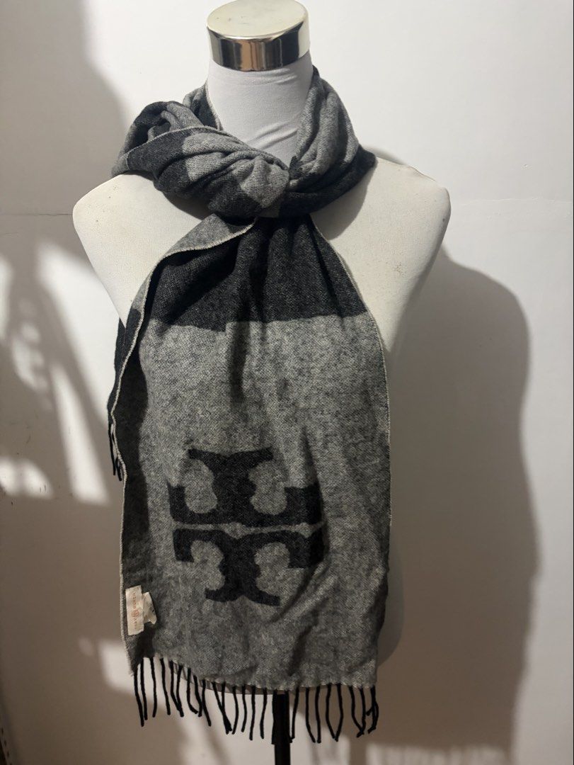 Tory Burch Scarf (Category: Scarves) located in Balanga. Submitted by momstyle.ph (Listing ID 1460644264, Image 1). Description: - Brand: Tory Burch - Color: Grey and Black - Material: 50% Cashmere, 50% Wool - Features: Iconic Tory Burch logo, fringe on ends - Benefit: Keeps you warm and stylish Sale price❤️.