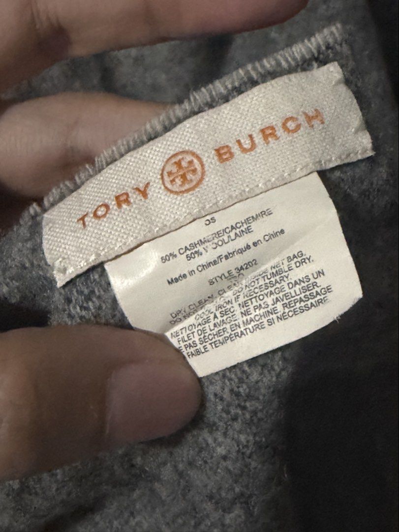 Tory Burch Scarf (Category: Scarves) located in Balanga. Submitted by momstyle.ph (Listing ID 1460644264, Image 2). Description: - Brand: Tory Burch - Color: Grey and Black - Material: 50% Cashmere, 50% Wool - Features: Iconic Tory Burch logo, fringe on ends - Benefit: Keeps you warm and stylish Sale price❤️.
