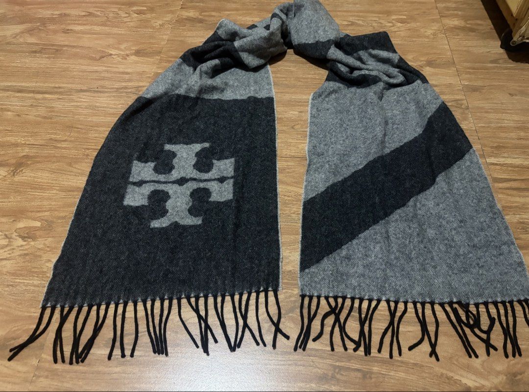 Tory Burch Scarf (Category: Scarves) located in Balanga. Submitted by momstyle.ph (Listing ID 1460644264, Image 3). Description: - Brand: Tory Burch - Color: Grey and Black - Material: 50% Cashmere, 50% Wool - Features: Iconic Tory Burch logo, fringe on ends - Benefit: Keeps you warm and stylish Sale price❤️.