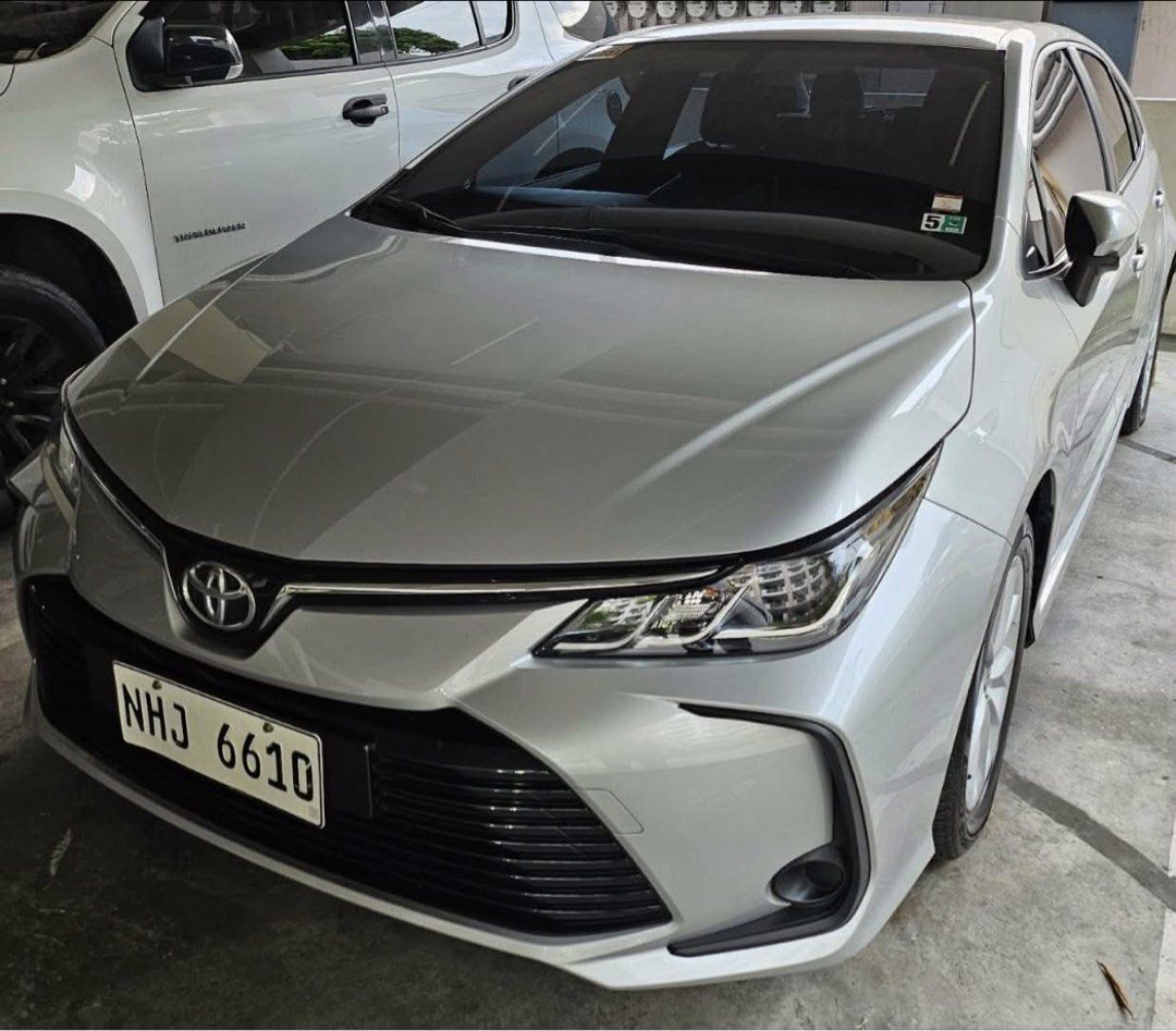 Toyota Corolla Altis 1.6 (A) (Category: Used Cars) located in Taguig. Submitted by jmarieb_09 (Listing ID 1460556577, Image 3). Description: 2023 TOYOTA COROLLA ALTIS 1.6G CVT Color: Metallic Silver Mileage: 24k ++ kms Date Purchased: July 31, 2023 Casa-maintained, fully-synthetic oil (Toyota Manila Bay) Coding: 0 (Friday) Price: PHP 800k Negotiable Available for viewing in Taguig For interested buyers, please DM Thank you!.