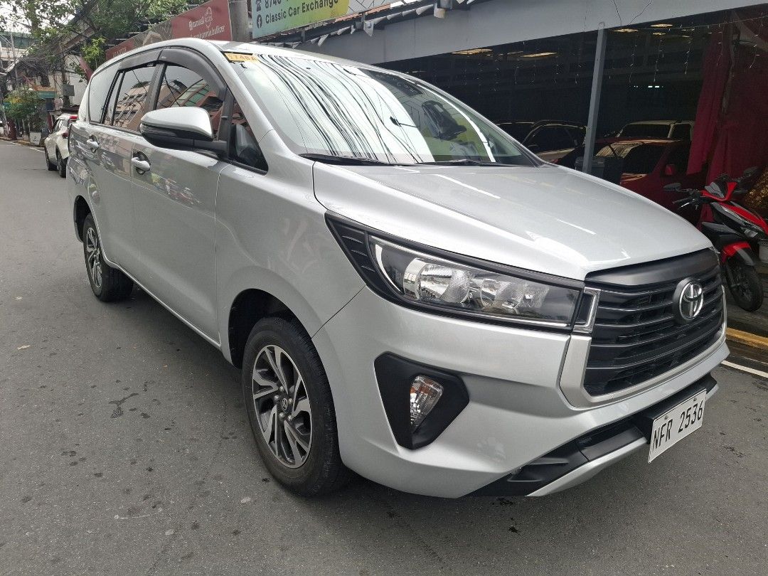 Toyota Innova E Auto (Category: Used Cars) located in Manila. Submitted by rammie.bullicer (Listing ID 1460600758, Image 2). Description: 🚘 Toyota Innova E 2024 🚘 ‼️995k (negotiable)‼️ ✔️ 1st Owmed ✔️ Automatic Transmission ✔️ 2 OEM Keys ✔️ Diesel Engine ✔️ Bnew deep dish Matting ✔️ 12k Original Mileage ✔️ Bnew Trunk Tray ✔️ Bnew Wide Rear View Mirror ✔️ Matte Black Garnish ✔️ Well Maintained ✔️ Sun/Rain Visor ✔️ you can bring your trusted mech