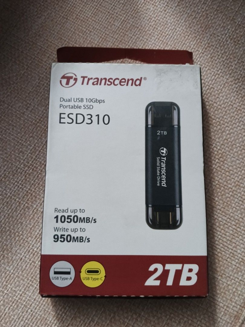 Transcend ESD310 2TB Dual USB 10Gbps Portable SSD (Category: Computer Parts) located in Quezon City. Submitted by jeffersona19407 (Listing ID 1460537281, Image 1). Description: - Transcend ESD310 Portable SSD - Massive 2TB Storage - Blazing Fast Speeds: Up to 1050MB/s Read, 950MB/s Write - Universal Compatibility: Works with both USB Type-A and USB Type-C ports - Ultra-Compact & Portable Design - Perfect for backups, large files, and fast transfe