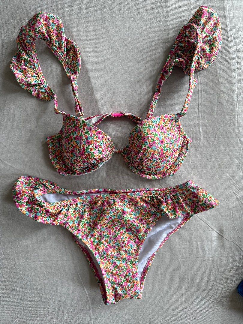 Trendyol Floral Ruffle Bikini Size 34 (Category: Bikinis & Swimsuits) located in Antipolo. Submitted by brebekah (Listing ID 1460561184, Image 1). Description: - Cute floral print bikini set - Ruffled edges on top and bottoms - Strappy back detail on the top - Trendyol brand - Size 34 - Ideal for beach or pool days RFS No longer fits me.