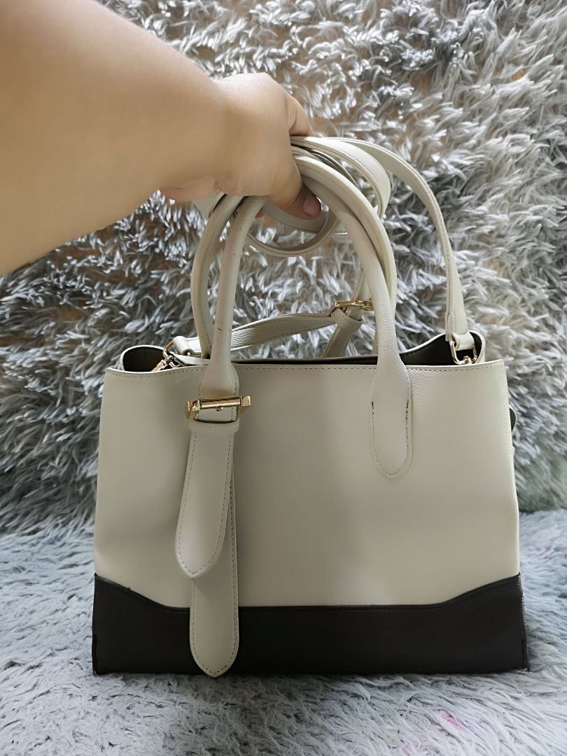 Two Tone Leather Tri Compartment Hand & Sling Bag (Category: Cross-body Bags) located in Santa Cruz. Submitted by jmy_surplus.2 (Listing ID 1460595958, Image 3). Description: Size ; L -9 W - 12 Color ; Matte Grey , Black Type ; Hand & Sling Bag Brand ; No brand Material ; Leather Style ; Leather Hand & Sling bag LR 167 JMY 1 Batch #219.