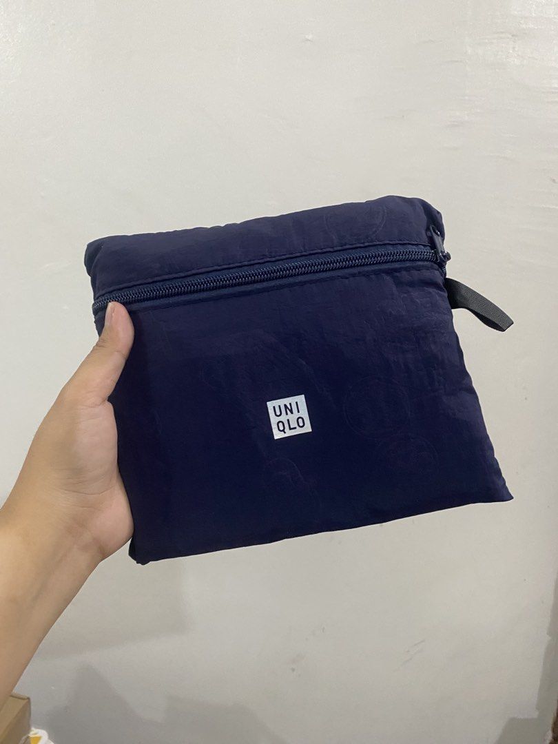 UNIQLO Duffle Bag Navy Blue- Packable (Category: Tote Bags) located in Manila. Submitted by lovekara (Listing ID 1460535529, Image 2). Description: 18x10 Inches.