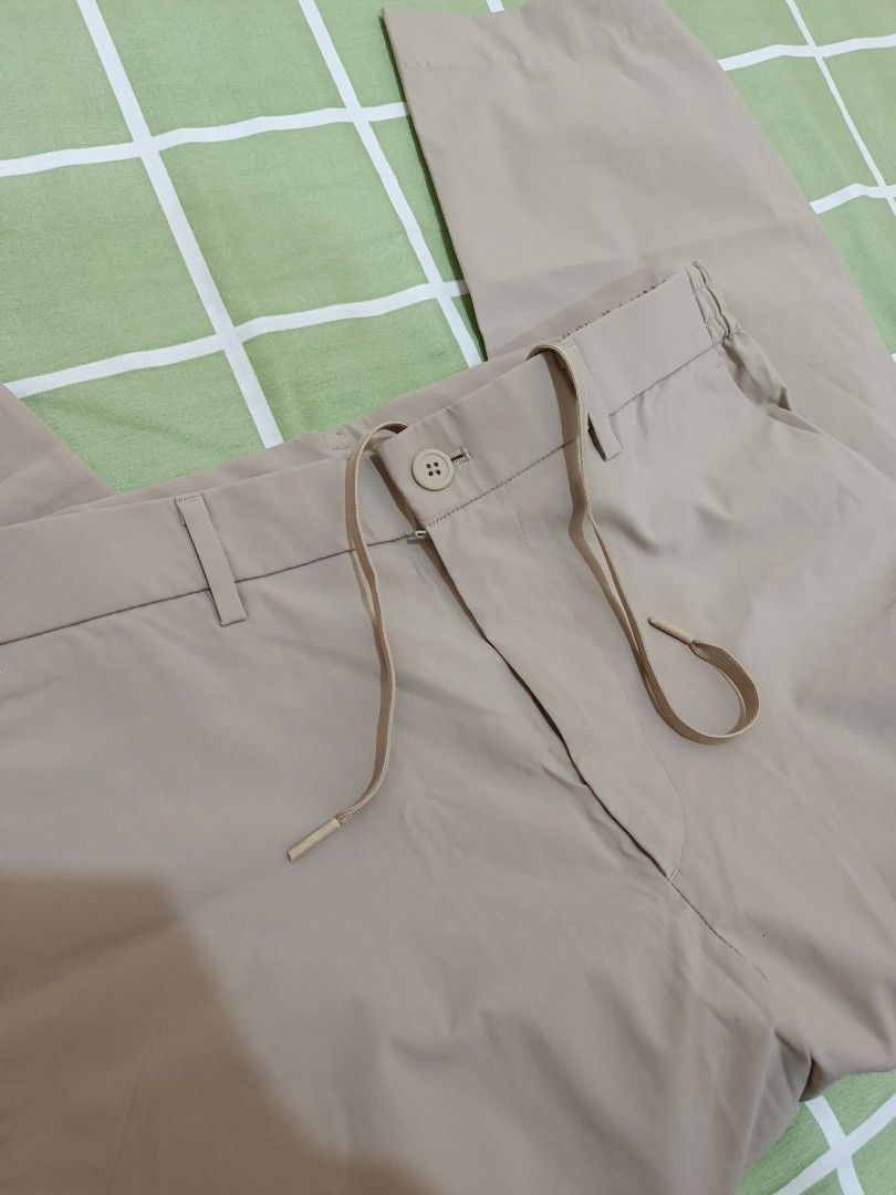Uniqlo Miracle Air Pants (Category: Trousers) located in Marikina City. Submitted by isseisells (Listing ID 1460508839, Image 2). Description: Never been used, tags removed only. This was already altered when I bought it at the store (Shortened length)..