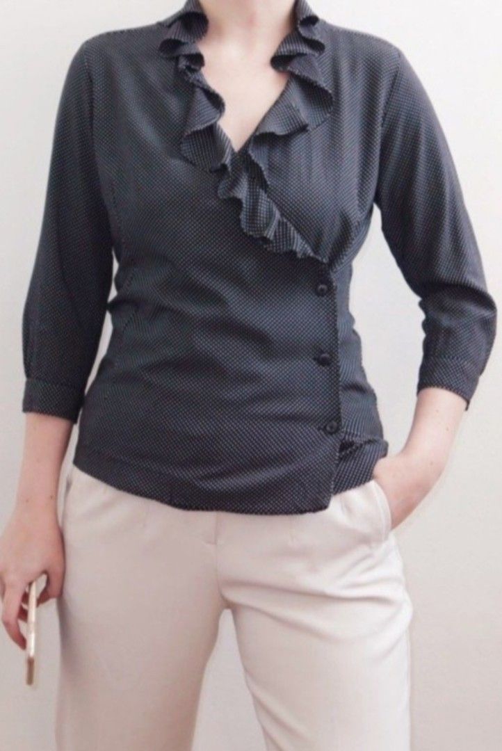 Uniqlo Polka Dot Ruffle Blouse (Category: Blouses) located in Manila. Submitted by PrinceDani.Clothing (Listing ID 1460566758, Image 1). Description: uniqlo x ines de la fressange pola ruffles top large on tag 20in width 23in length excellent condition .