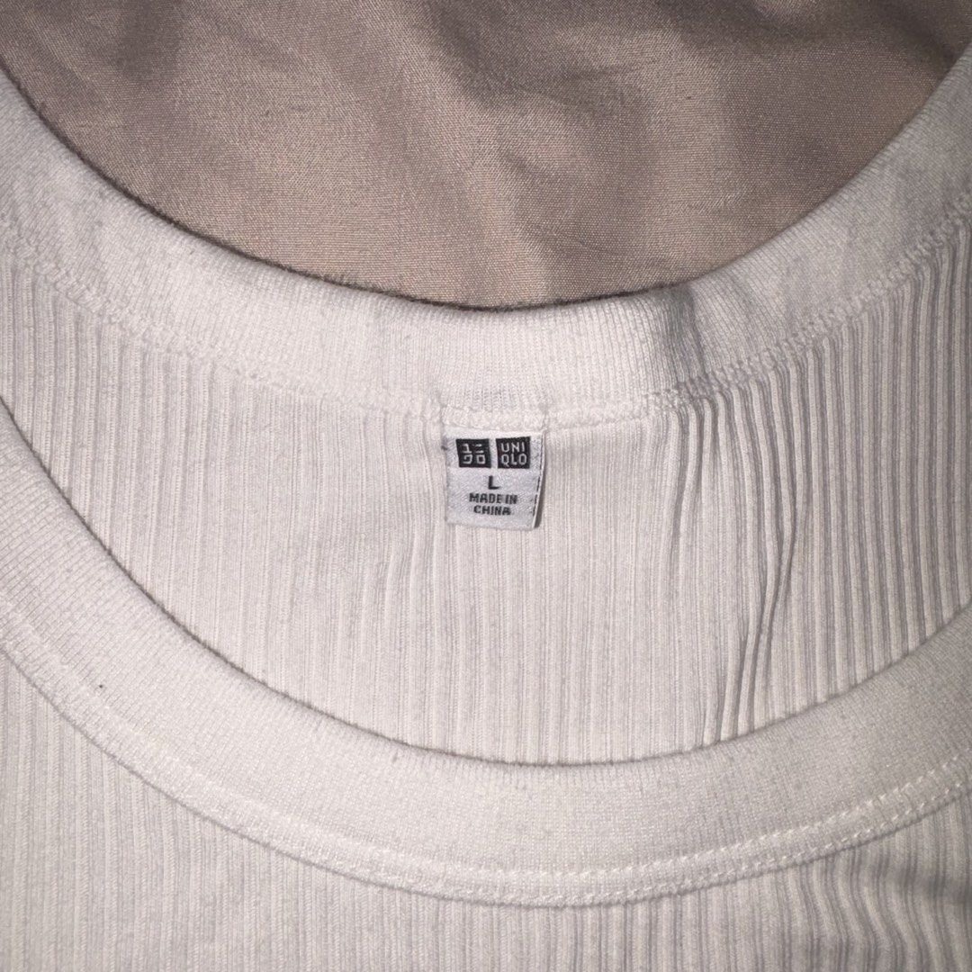 Uniqlo Ribbed Tank Tops (Category: Others Tops) located in Cavite. Submitted by yminhq (Listing ID 1460641485, Image 2). Description: Black Tank top: XL White tank top: L If u wanna buy separately 125 php each .