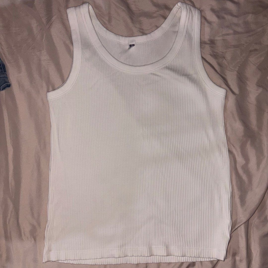 Uniqlo Ribbed Tank Tops (Category: Others Tops) located in Cavite. Submitted by yminhq (Listing ID 1460641485, Image 1). Description: Black Tank top: XL White tank top: L If u wanna buy separately 125 php each .