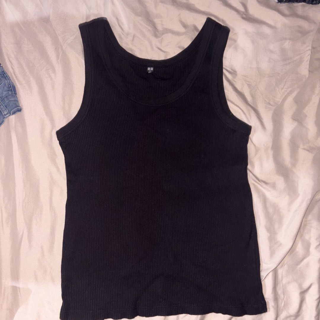 Uniqlo Ribbed Tank Tops (Category: Others Tops) located in Cavite. Submitted by yminhq (Listing ID 1460641485, Image 3). Description: Black Tank top: XL White tank top: L If u wanna buy separately 125 php each .