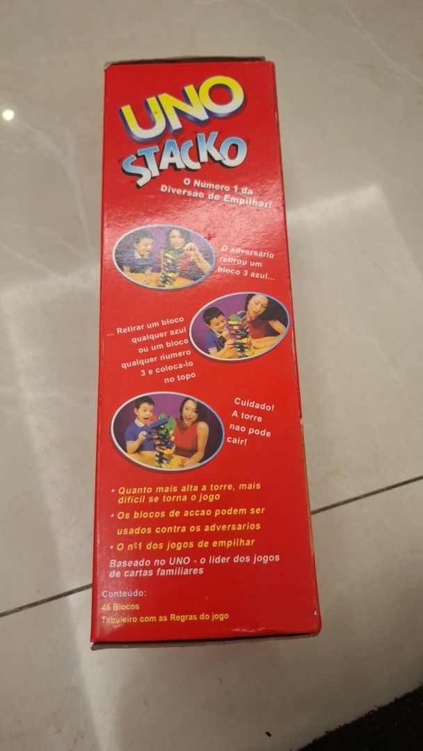 UNO Stacko Game - Fun Stacking and Pulling Blocks (Category: Board Games & Puzzles) located in Caloocan City. Submitted by epicmoon-9beaf2 (Listing ID 1460612733, Image 2). Description: - UNO Stacko: The exciting stacking game based on UNO! - How to Play: Pull blocks and stack them on top, making the tower taller and more challenging. - Perfect for Family Game Nights: Guaranteed fun for everyone. - What's Included: 45 colorful blocks and the game