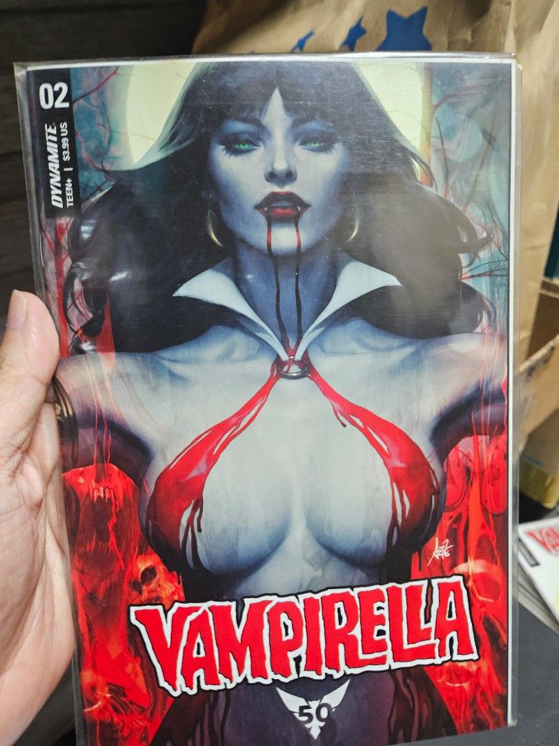 Vampirella Comic Books Set Lot - Issues 01, 02, 04, 50 (Category: Comics & Manga) located in Taguig. Submitted by gowilliam.767 (Listing ID 1460517445, Image 1). Description: - Lot of 4 Vampirella comic books - Includes issues: 01, 02, 04, and 50 - Published by Dynamite Entertainment - Rated Teen+ - Great for any Vampirella collector or fan!.