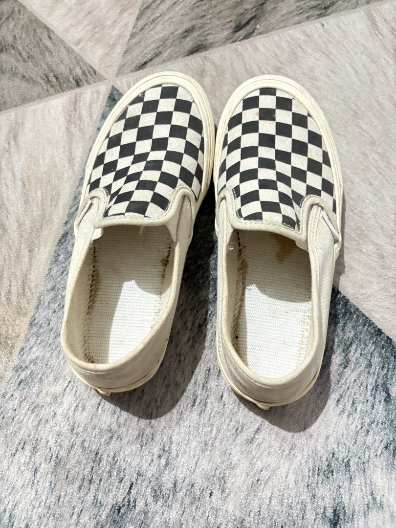 Vans Checkerboard Slip-On Shoes (Category: Sneakers) located in Baler. Submitted by yansboutique2023 (Listing ID 1460710998, Image 3). Description: - Classic Vans checkerboard slip-on shoes - Beige/off-white color - Made of durable canvas material - Shows some signs of wear on insoles and edges - Plenty of life remaining for continued use - Ideal for everyday casual wear.
