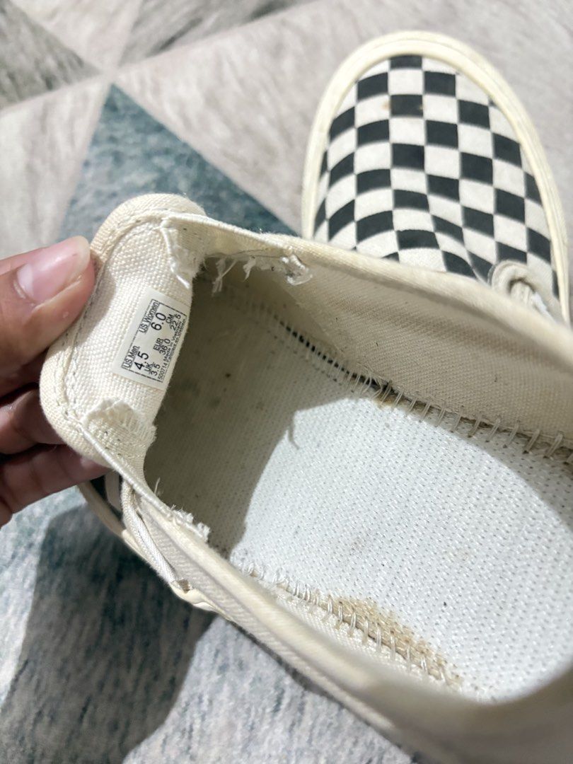 Vans Checkerboard Slip-On Shoes (Category: Sneakers) located in Baler. Submitted by yansboutique2023 (Listing ID 1460710998, Image 2). Description: - Classic Vans checkerboard slip-on shoes - Beige/off-white color - Made of durable canvas material - Shows some signs of wear on insoles and edges - Plenty of life remaining for continued use - Ideal for everyday casual wear.