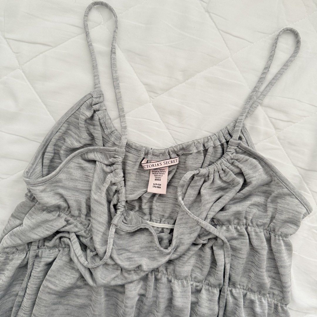 Victoria Secret Cami Ruffle (Category: Sleeveless) located in Davao. Submitted by aug_amari (Listing ID 1460538937, Image 2). Description: size small no when worn.