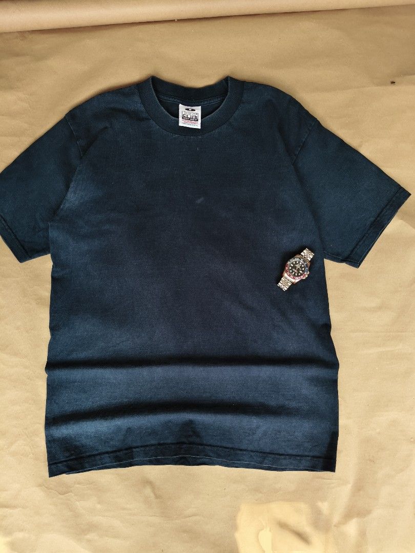 Vintage Black T-shirt (Category: Tshirts & Polo Shirts ) located in Manila. Submitted by thriftclothin (Listing ID 1460533703, Image 1). Description: - Classic black t-shirt - Size M - Vintage-inspired look - Simple and versatile design - Ideal for casual wear - Please check photos for detailed condition.