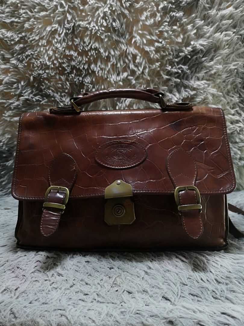 Vintage Embossed Pattern Messenger Bag (Category: Sling Bags) located in Santa Cruz. Submitted by jmy_surplus.2 (Listing ID 1460587291, Image 1). Description: Size ; L - 10 W - 14 Color ; Brown Type ; Messenger Bag Brand ; No brand Material ; Leather Style ; Brown leather Central Push Lock Closure messenger bag LR 167 JMY 1 Batch #219.