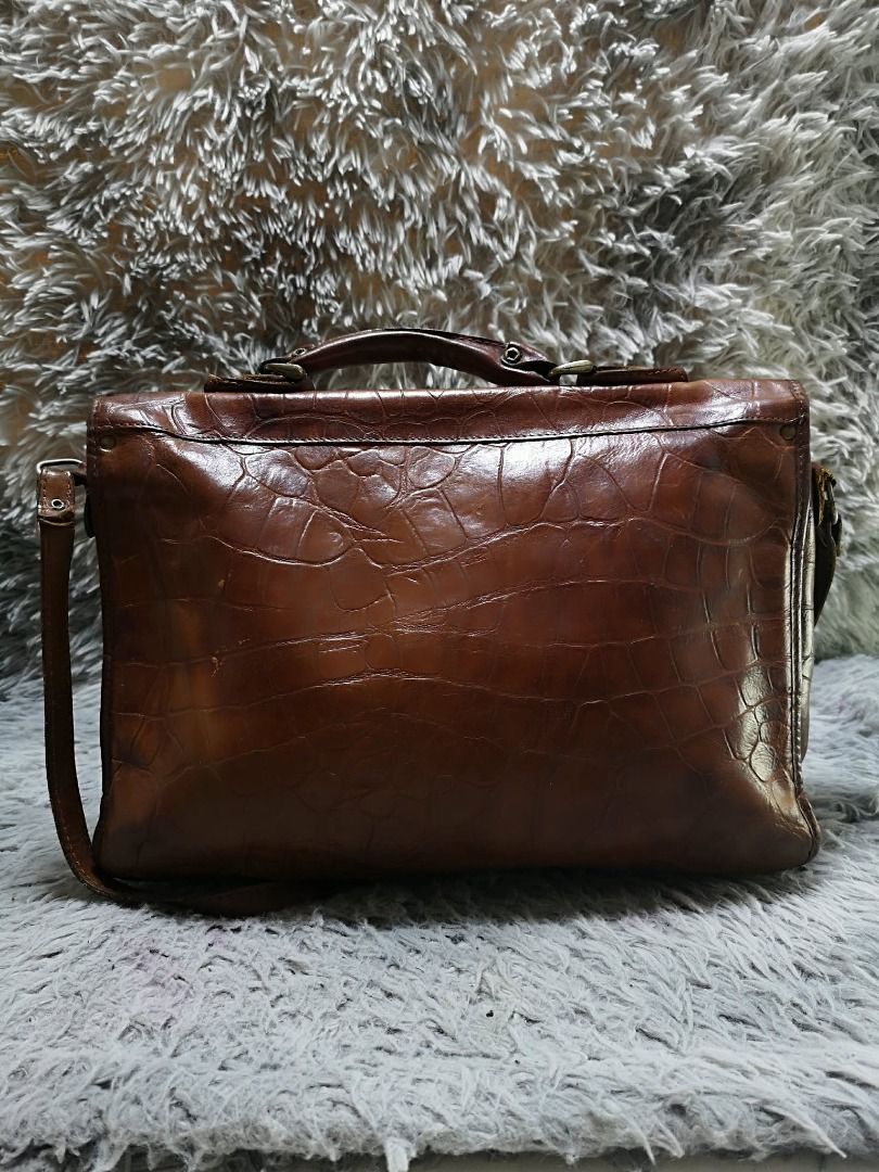 Vintage Embossed Pattern Messenger Bag (Category: Sling Bags) located in Santa Cruz. Submitted by jmy_surplus.2 (Listing ID 1460587291, Image 2). Description: Size ; L - 10 W - 14 Color ; Brown Type ; Messenger Bag Brand ; No brand Material ; Leather Style ; Brown leather Central Push Lock Closure messenger bag LR 167 JMY 1 Batch #219.