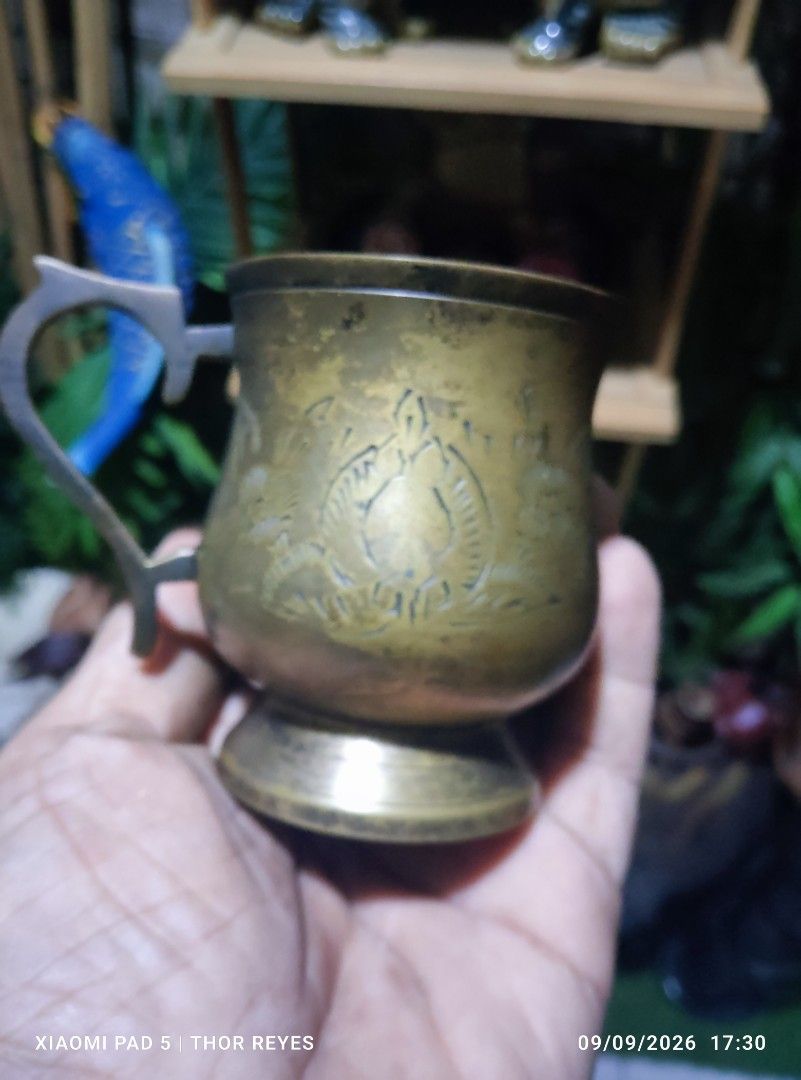 Vintage Engraved Brass Footed Mug (Category: Other Home Decor) located in Valenzuela. Submitted by mighthor0526 (Listing ID 1460605374, Image 1). Description: Preloved vintage Middle East item No issue Payment thru Gcash or Abono by Lalamove rider Delivery by rider or shipping will be shouldered by the buyer Pm me if interested .