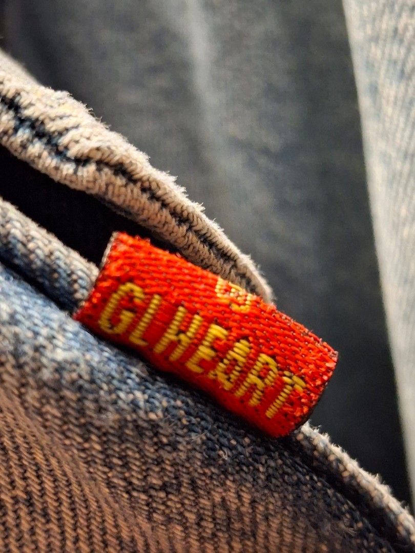 Mens Vintage Denim Jacket (Category: Coats, Jackets and Outerwear) located in Baguio. Submitted by give_fad15730 (Listing ID 1460671540, Image 3). Description: GL HEART MENS -Shoulder:15in. -W:19in. -Arm:24in. -L:23in. - Classic light wash denim jacket - Two chest pockets with button closures - Button front and cuffs - Red tab detail on the side - Leather patch inside shows some wear - A versatile wardrobe staple.