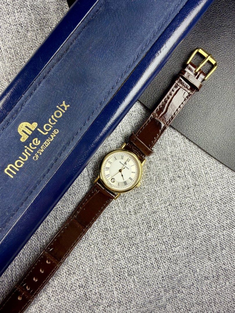 Vintage Maurice Lacroix Arios (Category: Women's Watches) located in Bacoor. Submitted by offtheclock (Listing ID 1460681583, Image 1). Description: Vintage Maurice Lacroix Arios Condition: Pre-owned Reference No. AR1013-YP011-110-1 Movement: Swiss Quartz (ML800) Material: Stainless Steel Yellow Gold-Plated Case Diameter: 28mm (Sapphire Crystal) Dial: Classic Lacquered White / Silver Inclusion: Brandnew Aftermarket Brown Leather Strap Inclusion: 