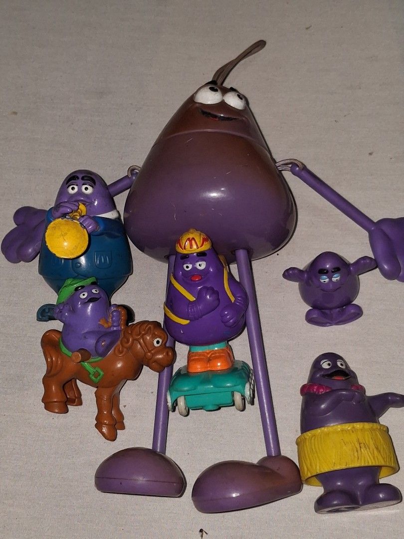 Vintage McDonald's Grimace Shake Toy Set (Category: Vintage Collectibles) located in Manila. Submitted by marcas022798212 (Listing ID 1460620255, Image 1). Description: - Set of vintage McDonald's Grimace toys - Includes Grimace figures and accessories - Some pieces are detachable - Ideal for collectors and fans of classic McDonald's memorabilia - Fun, nostalgic items from the past.